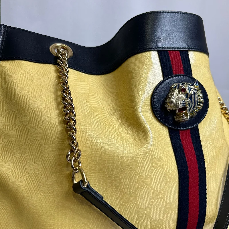 Women Gucci bags with a snap - button closure and a decorative charmGucci - Sac Cabas Rajah