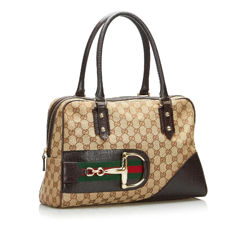 Women Gucci Sylvie bags with a monogram - embossed leatherGucci GG Canvas Hasler Handbag (SHG-7i2EZI)