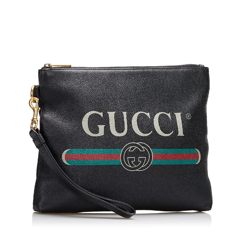 Ladies Gucci handbags with a detachable coin purse insideGucci Logo Leather Clutch (SHG-Kmt4iX)