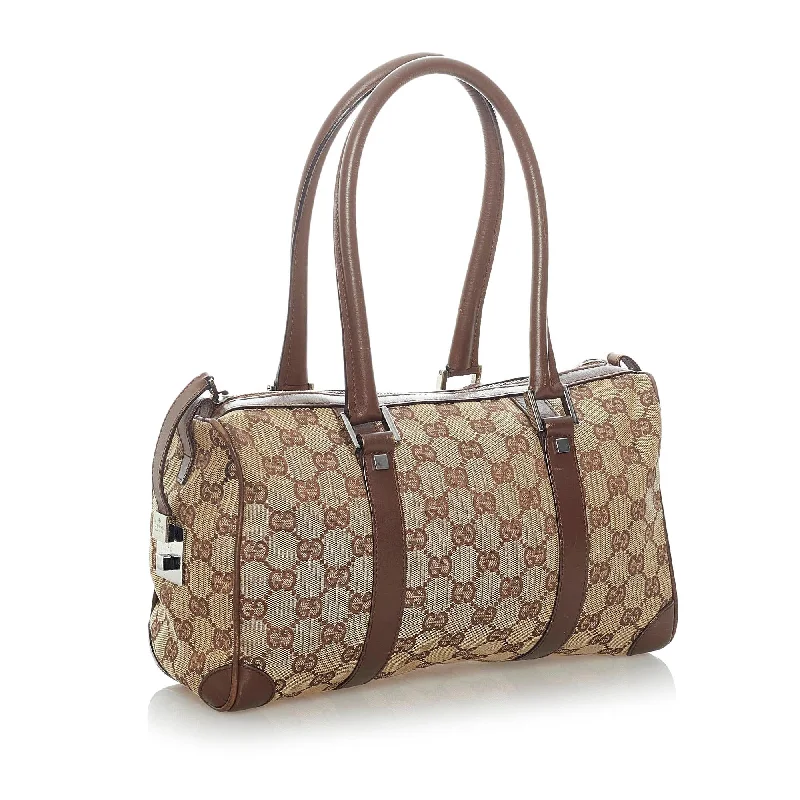 Women Gucci bags with a magnetic snap closure for easy accessGucci GG Canvas Boston Bag (33086)