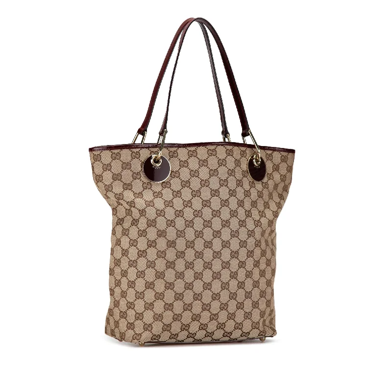 Women Gucci bags with interlocking G hardware for a classic lookGucci GG Canvas Eclipse Tote uZPc1Y)