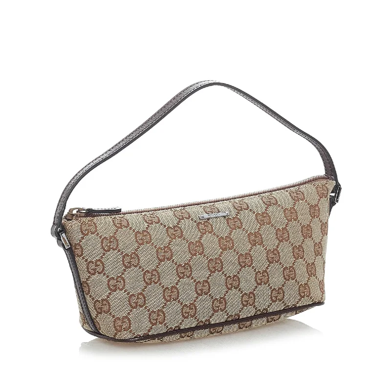 Women Gucci bags with a snap - button closure and a decorative charmGucci GG Canvas Boat Baguette (32689)