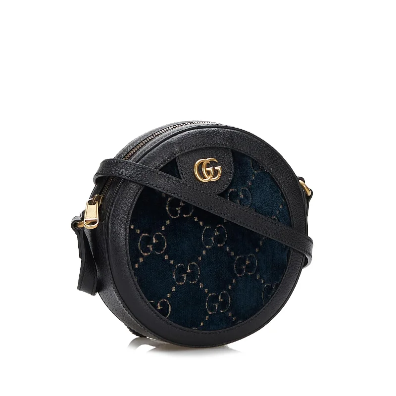 Gucci backpacks for women with a padded laptop compartmentGucci GG Marmont Round Velvet Crossbody Bag (SHG-zcr70n)