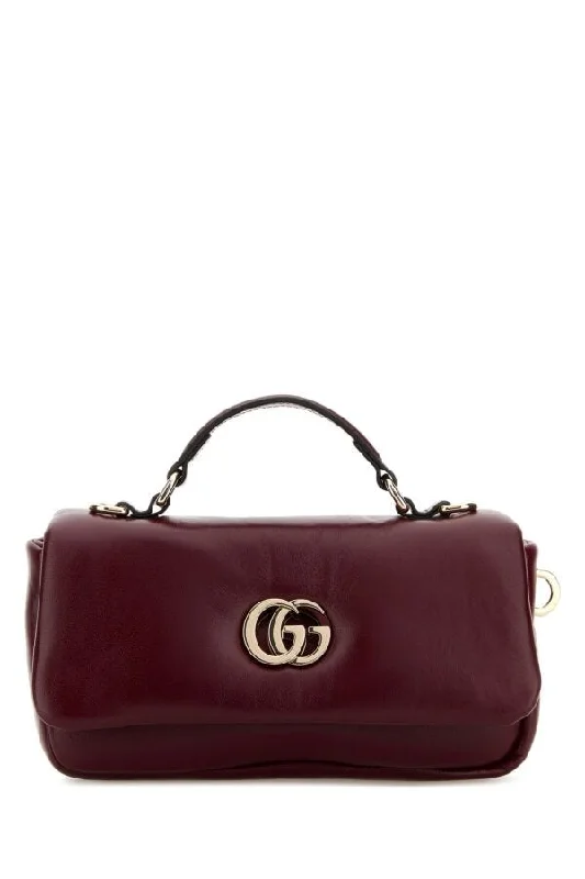 Women Gucci bags with interlocking G hardware for a classic lookGucci Woman Burgundy Leather Handbag