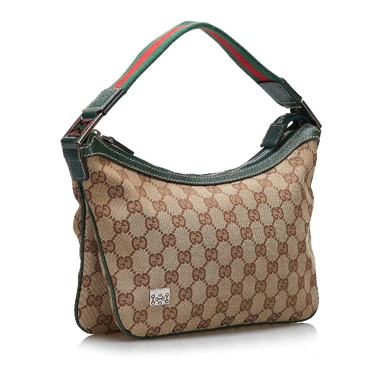 Gucci handbags for women with a patent - leather finishGucci GG Canvas Web Baguette (SHG-zCaOiu)