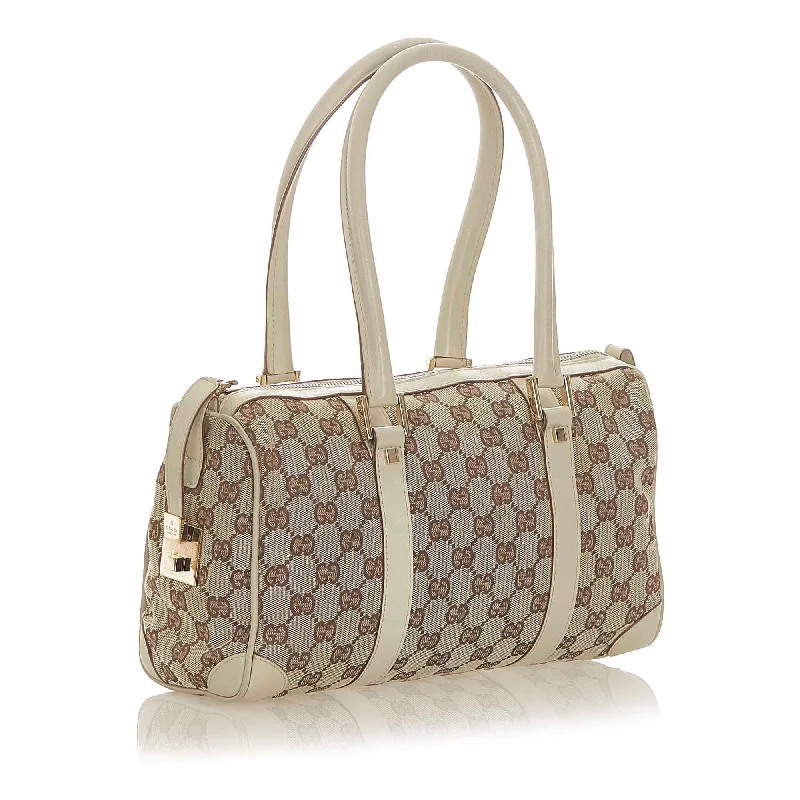 Women Gucci Sylvie bags featuring the signature web stripeGucci GG Canvas Boston Bag (20383)