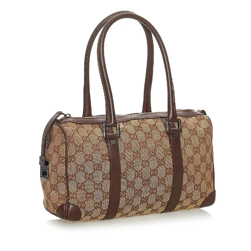 Ladies Gucci Dionysus bags with a star - shaped charmGucci GG Canvas Boston Bag (28109)