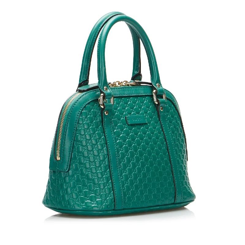 Gucci Marmont bags for women with a snakeskin - effect panelGucci Mini Microguccissima Dome Satchel (SHG-0O0L9R)