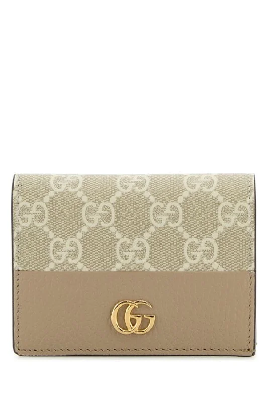 Ladies Gucci shoulder bags with a single - handle designGucci Woman Gg Supreme Fabric And Leather Gg Marmont Wallet