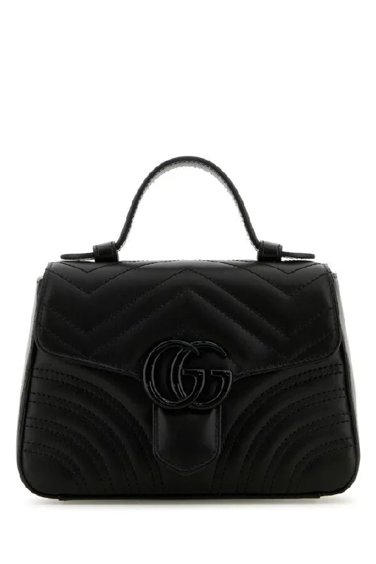 Women Gucci Sylvie bags with a crystal - embellished web stripeGucci Woman Black Leather Marmont Handbag