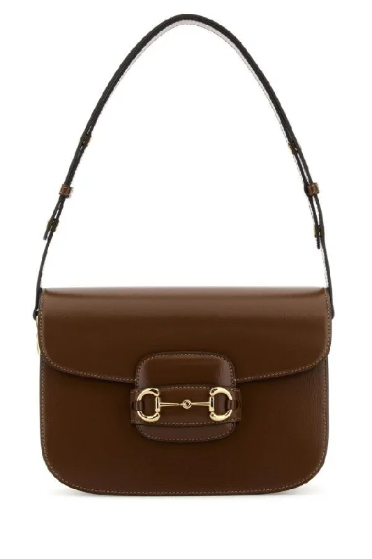 Ladies Gucci Dionysus bags with a star - shaped charmGucci Woman Brown Leather 1955 Horsebit Shoulder Bag