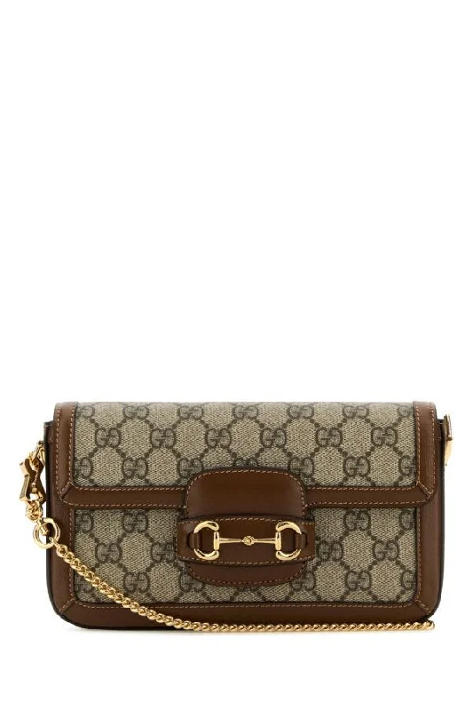 Women Gucci Sylvie bags with a monogram - embossed leatherGucci Woman Gg Supreme Fabric Mini Gucci Horsebit 1955 Handbag