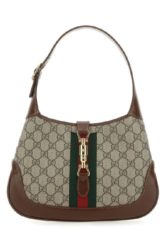 Ladies Gucci shoulder bags with a tassel decorationGucci Woman Gg Supreme Fabric And Leather Small Jackie 1961 Handbag