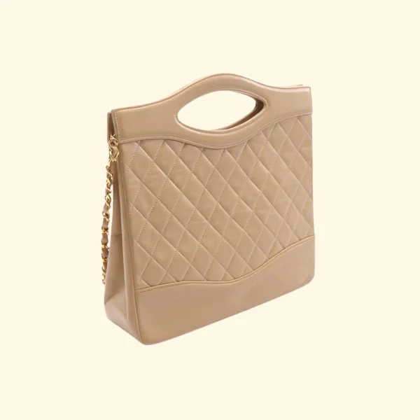 Chanel Designer Handbag with Unique DesignChanel Matelasse Handbag Lambskin Beige Gold Hardware