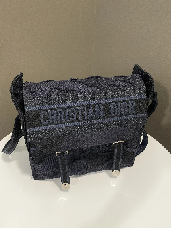 Christian Dior handbags with a snap - button closure and a decorative buckleDior Diorcamp Bag Navy