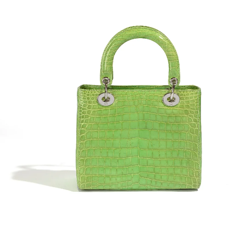 Christian Dior Saddle bags with a studded trim for a bold lookDior Green Exotic Lady