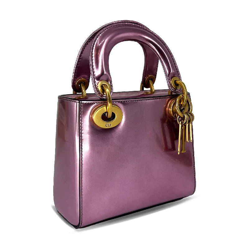 Christian Dior tote bags with a printed Dior logo on the frontMini Lady Dior bag metallic pink calfskin